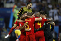 <p>Belgian players celebrate after upsetting Brazil 2-1 in the World Cup quarter finals </p>