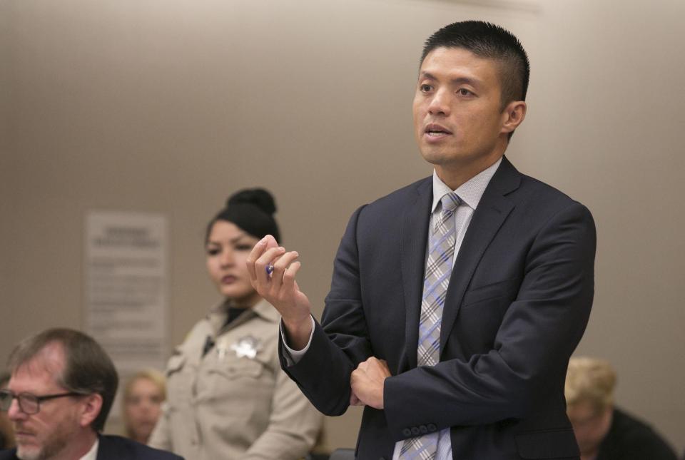 Deputy District Attorney Leonard Trinh questions witness Oscar Stewart during a preliminary hearing for John Earnest, Thursday, Sept. 19, 2019, in Superior Court in San Diego. Prosecutors say Earnest opened fire during a Passover service at the Chabad of Poway synagogue on April 27, killing one woman and injuring three people, including the rabbi. (John Gibbins/The San Diego Union-Tribune via AP, Pool)