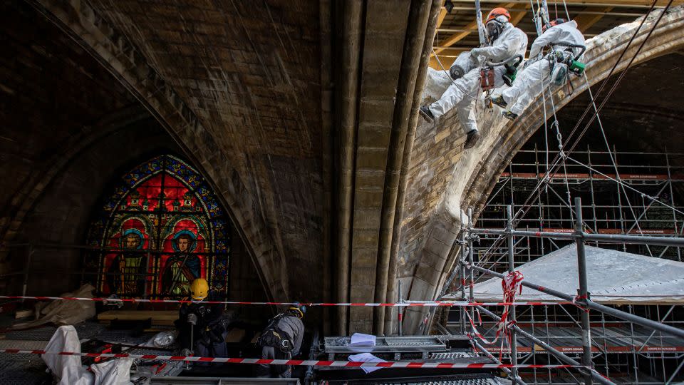 Some 500 craftspeople are working on the cathedral repairs. - Ian Langsdon/Pool/Reuters