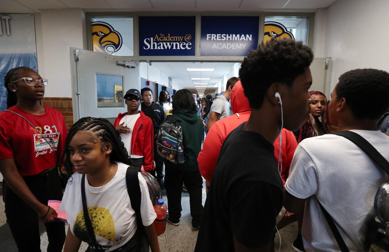 Students head to lunch on the first day of school at The Academy @ Shawnee in Louisville, Ky. on Aug. 9, 2023.  Enrollment has increased by 400 students this year.