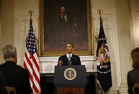 U.S. President Barack Obama delivers remarks on the end of the U.S. government shutdown in the State Dining Room of the White House in Washington, October 17, 2013. REUTERS/Jason Reed