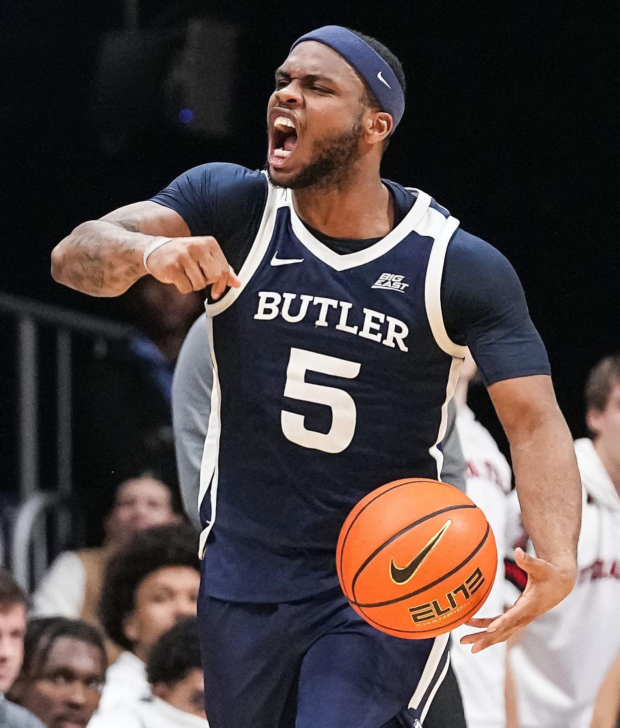 Butler Bulldogs guard Posh Alexander (5) yells in excitement Thursday, Nov. 30, 2023, during the game at Hinkle Fieldhouse in Indianapolis. The Butler Bulldogs defeated the Texas Tech Red Raiders in overtime, 103-95.