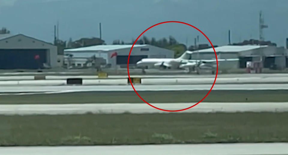 Cessna 208 plane landing at  Palm Beach International Airport in Florida