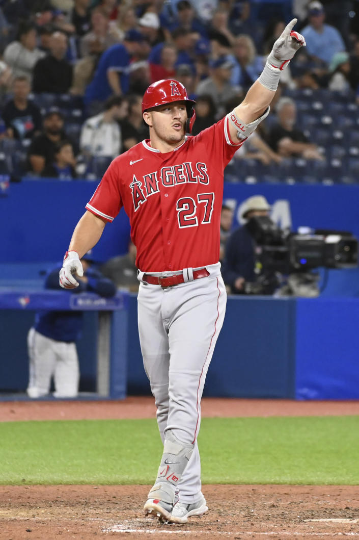 Los Angeles Angels' Mike Trout celebrates after hitting a two-run home run off Toronto Blue Jays' relief pitcher Yusei Kikuchi in eighth-inning baseball game action in Toronto, Friday, Aug. 26, 2022. (Jon Blacker/The Canadian Press via AP)