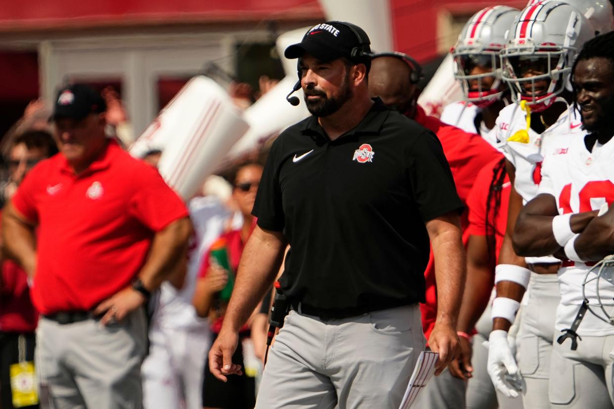 Sep 2, 2023; Bloomington, Indiana, USA; Ohio State Buckeyes head coach Ryan Day watches from the sideline during the NCAA football game at Indiana University Memorial Stadium. Ohio State won 23-3.