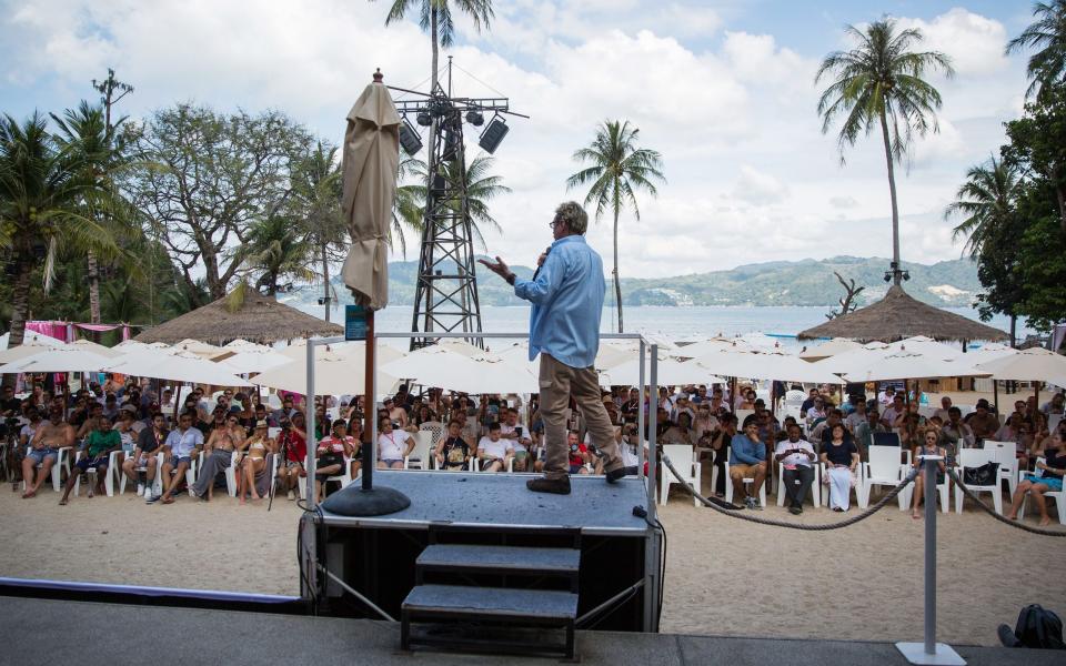 McAfee speaking at a conference event in Phuket, Thailand, 2018 - Taylor Weidman/Bloomberg