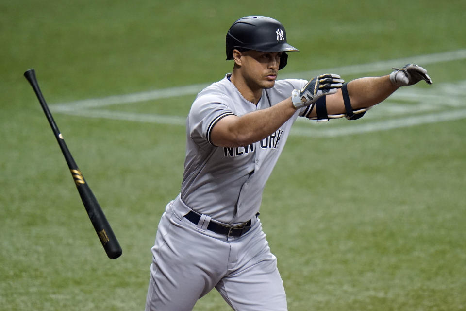 New York Yankees' Giancarlo Stanton reacts as he flies out to Tampa Bay Rays right fielder Brett Phillips during the third inning of a baseball game Thursday, May 13, 2021, in St. Petersburg, Fla. (AP Photo/Chris O'Meara)