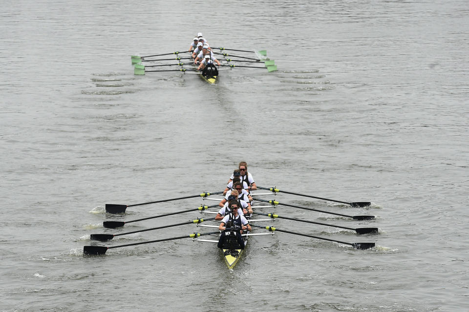 Cambridge, top, hold a significant lead on the Oxford boat during the Women's Boat Race on the River Thames in London, Sunday April 7, 2019. Cambridge went on to win the annual Women's Boat Race traditionally fought out between Oxford and Cambridge university rowing crews. (Kirsty O'Connor/PA via AP)
