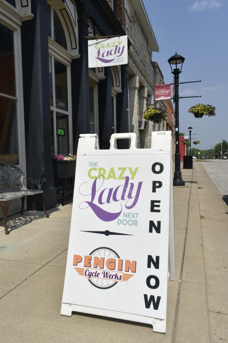 The interesting array of items for sale at The Crazy Lady Next Door shop on Main Street in Gosport includes socks with racy messages, ornate costume jewelry and household goods ranging from kitchen magnets to pillows.