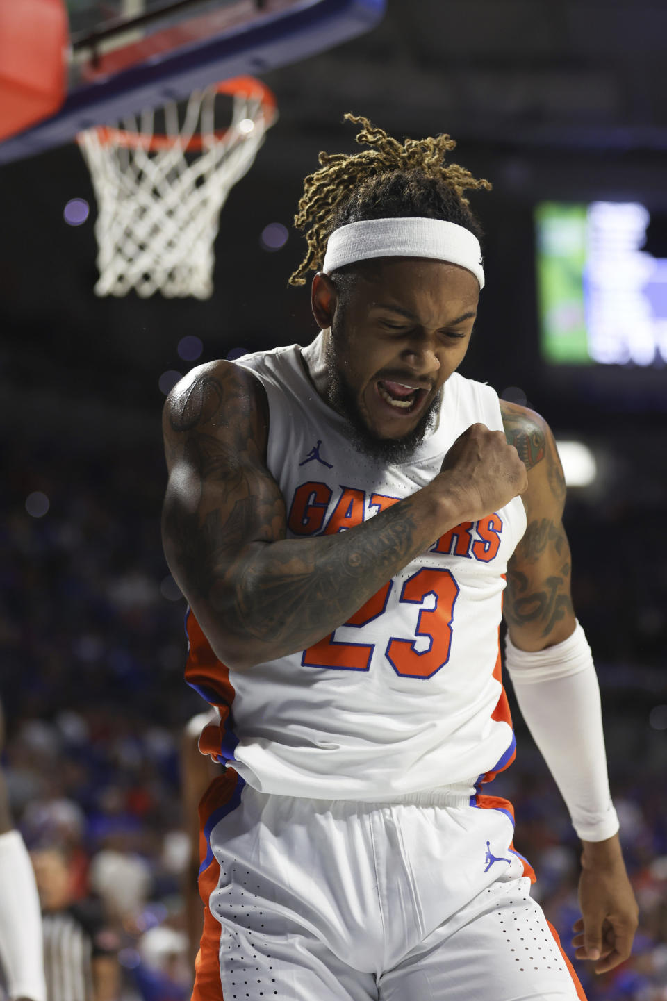 Florida guard Brandon McKissic (23) reacts after a play against Troy during the first half of an NCAA college basketball game Sunday, Nov. 28, 2021, in Gainesville, Fla. (AP Photo/Matt Stamey)