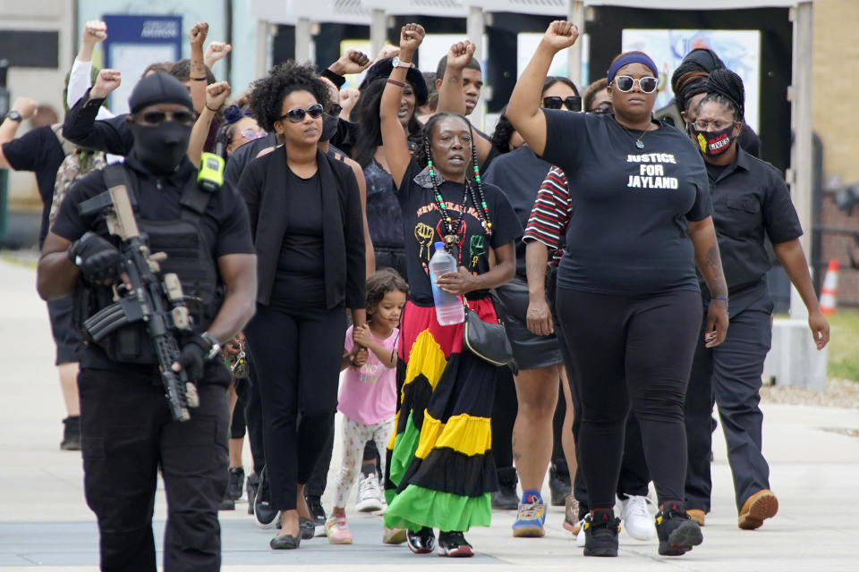 A group arrives to pay their respects at a memorial service for Jayland Walker, Wednesday, July 13, 2022, at the Akron Civic Center in Akron, Ohio.<span class="copyright">Gene J. Puskar–AP</span>