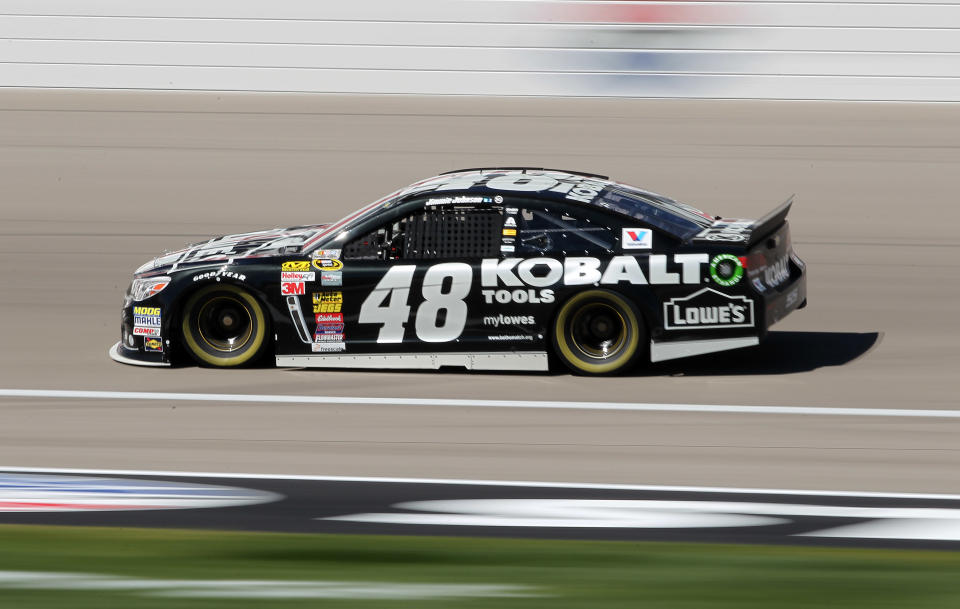 Jimmie Johnson drives during NASCAR Sprint Cup auto racing practice Friday, March 7, 2014, in Las Vegas. (AP Photo/Isaac Brekken)