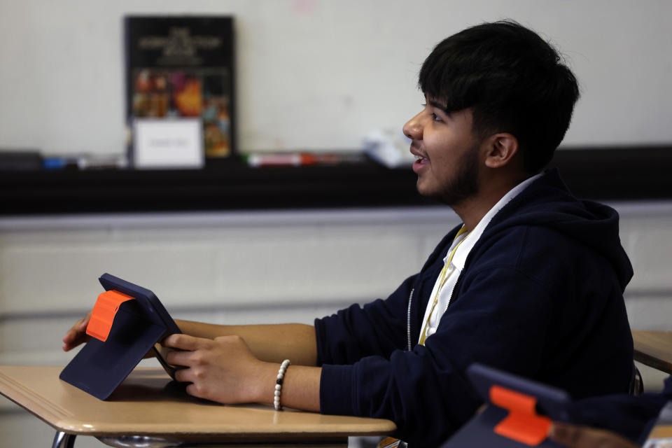 Audible Miranda Cambron asks a question in a class preparing him for the digital SAT, Wednesday, March 6, 2024, at Holy Family Cristo Rey Catholic High School in Birmingham, Ala. (AP Photo/Butch Dill)