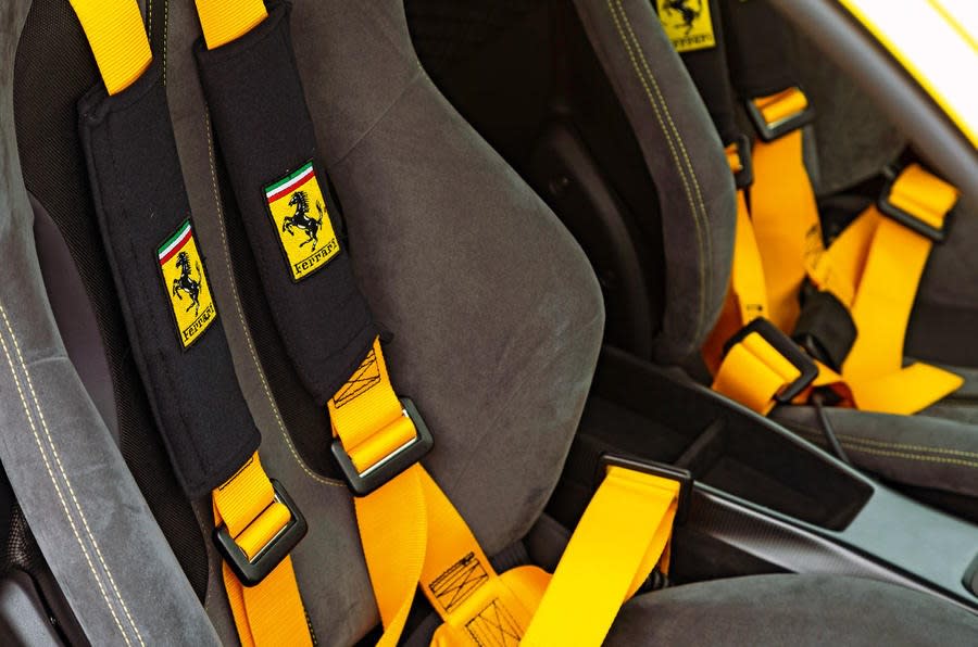 <p>Another <strong>motorsport-inspired</strong> add-on that thankfully seems to be receding into the time that taste forgot. Where racing drivers use broad safety straps to spread the load in any collision, these wraparound seat belt appendages do nothing for safety.</p><p>For those who prefer a more luxury-leaning seat belt padding, you can also acquire them in leather, faux fur or even <strong>sheepskin</strong>.</p>