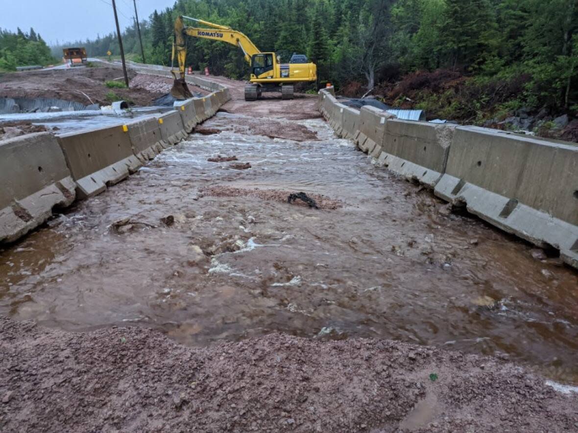 Heavy rainfall forced Parks Canada to close this section of a detour road on the Cabot Trail near Ingonish. (Parks Canada - image credit)