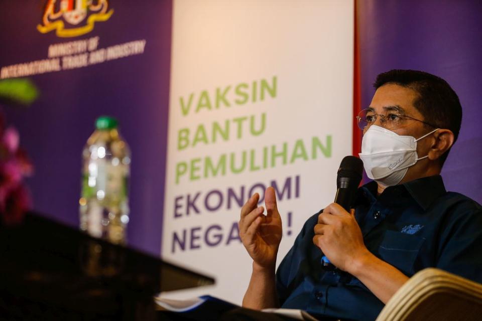 Minister of International Trade and Industry Datuk Seri Azmin Ali speaks to the press during a visit to the Bukit Jawi Golf Resort vaccination centre in Penang June 17, 2021. — Picture by Sayuti Zainudin