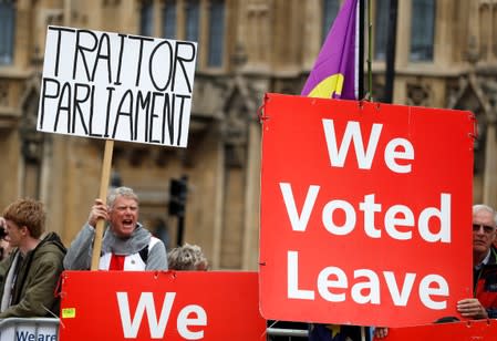 Pro-Brexit demonstrators protest outside the Houses of Parliament in Westminster in London