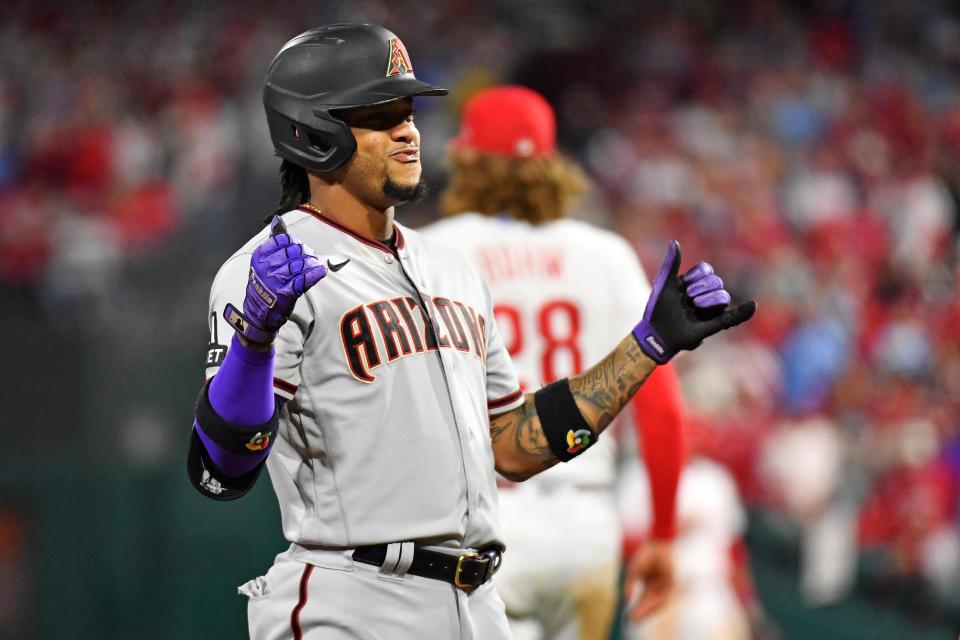 Ketel Marte celebrates after his RBI triple in the fifth inning of Game 5.