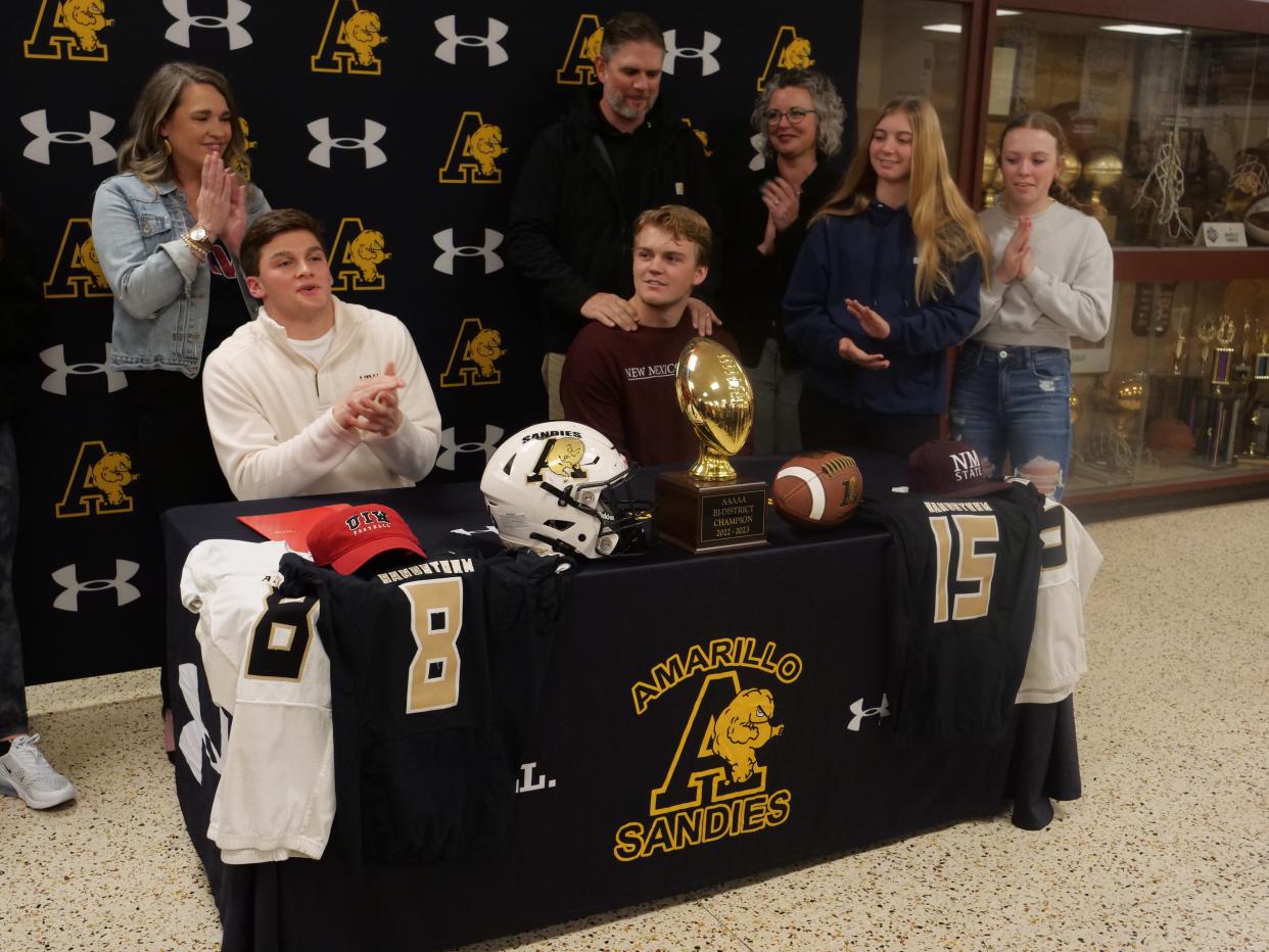 Amarillo High's Jameson Garcia (seated left) and Mason Graham (seated right) signed their National Letters of Intent to play college football on Thursday, January 19, 2023 at Amarillo High School.