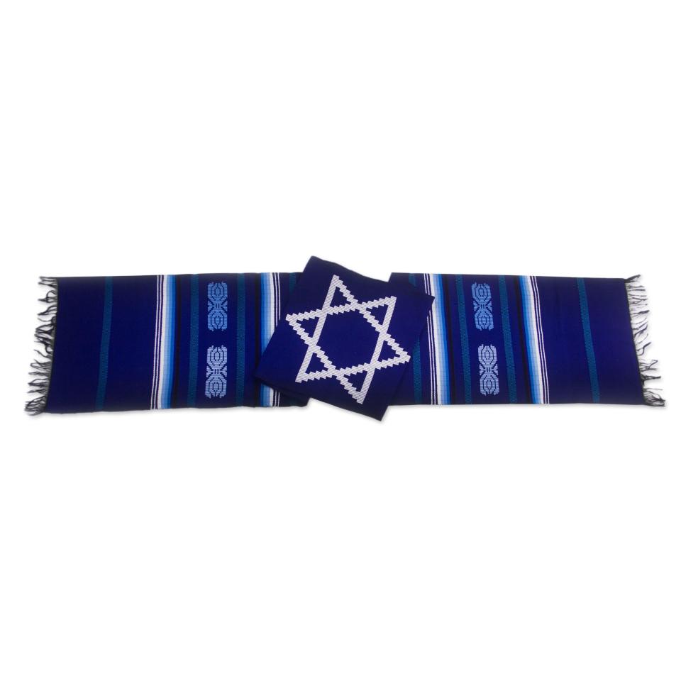 <p><a href="https://go.redirectingat.com?id=74968X1596630&url=https%3A%2F%2Fwww.novica.com%2Fp%2Fhand-loomed-cotton-table-runner-star-of-david%2F213908%2F&sref=https%3A%2F%2Fwww.womansday.com%2Fhome%2Fdecorating%2Fg34087622%2Fhanukkah-decorations%2F" rel="nofollow noopener" target="_blank" data-ylk="slk:Shop Now;elm:context_link;itc:0;sec:content-canvas" class="link ">Shop Now</a></p><p>Hand Loomed Cotton Table Runner, "Star of David on Blue"</p><p>novica.com</p><p>$87.99</p>