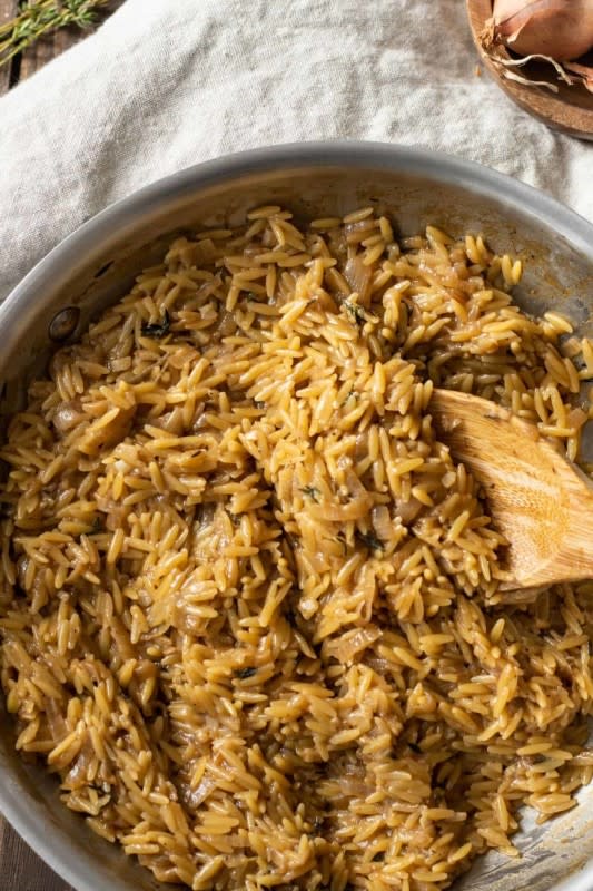 <p>This Home Kitchen</p><p>This orzo is savory, garlicky, and just a touch sweet from the shallots and thyme. The parmesan adds creaminess without making it heavy.</p><p><strong>Get the recipe: </strong><a href="https://thishomekitchen.com/garlic-parmesan-orzo/?fbclid=IwAR0QKMxGuEuCjzOH1sILlNbXhWo5xDnvQHWd5c1h9bZ0B2wH9oxFvOqjjJM" rel="nofollow noopener" target="_blank" data-ylk="slk:Garlic Parmesan Orzo with Caramelized Shallots;elm:context_link;itc:0;sec:content-canvas" class="link "><strong>Garlic Parmesan Orzo with Caramelized Shallots</strong></a></p>