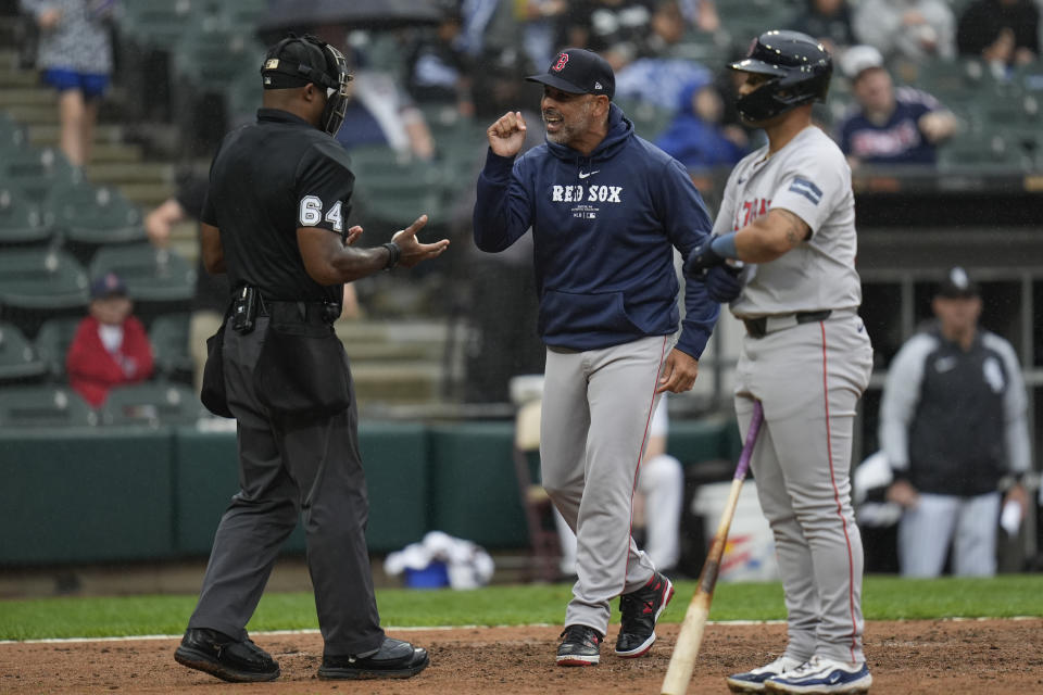 Boston Red Sox manager Alex Cora argues a strikeout call with umpire Alan Porter before being ejected during the fifth inning of a baseball game against the Chicago White Sox, Saturday, June 8, 2024, in Chicago. (AP Photo/Erin Hooley)