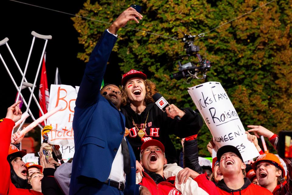 Students take selfies with host Harry Douglas after winning the cheesiest fan before the filming of ESPN’s “College GameDay” show at the University of Utah in Salt Lake City on Saturday, Oct. 28, 2023. | Megan Nielsen, Deseret News