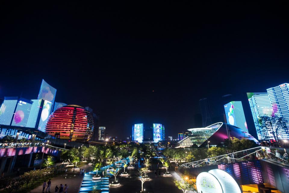 Qianjiang New Town performs light show to welcome the upcoming G20 Hangzhou Summit on August 28, 2016 in Hangzhou.