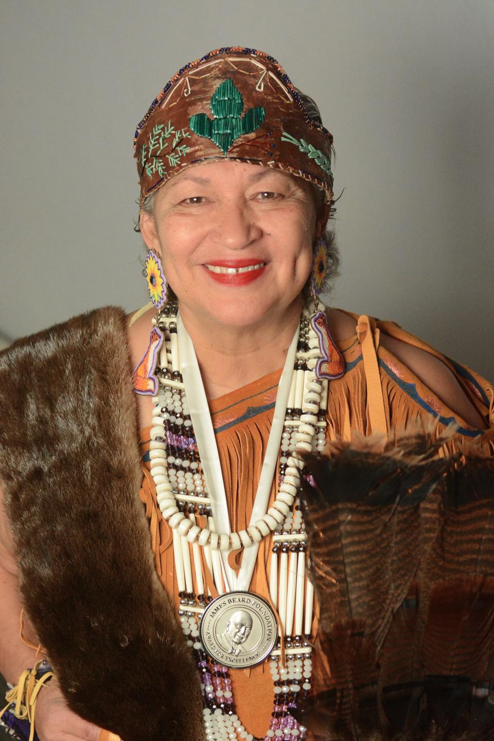 Sherry Pocknett, USA Today Connecticut Woman of the Year and James Beard Foundation award recipient, in traditional Mashpee Wampanoag tirbal regalia at her Preston home Friday January 12, 2024.