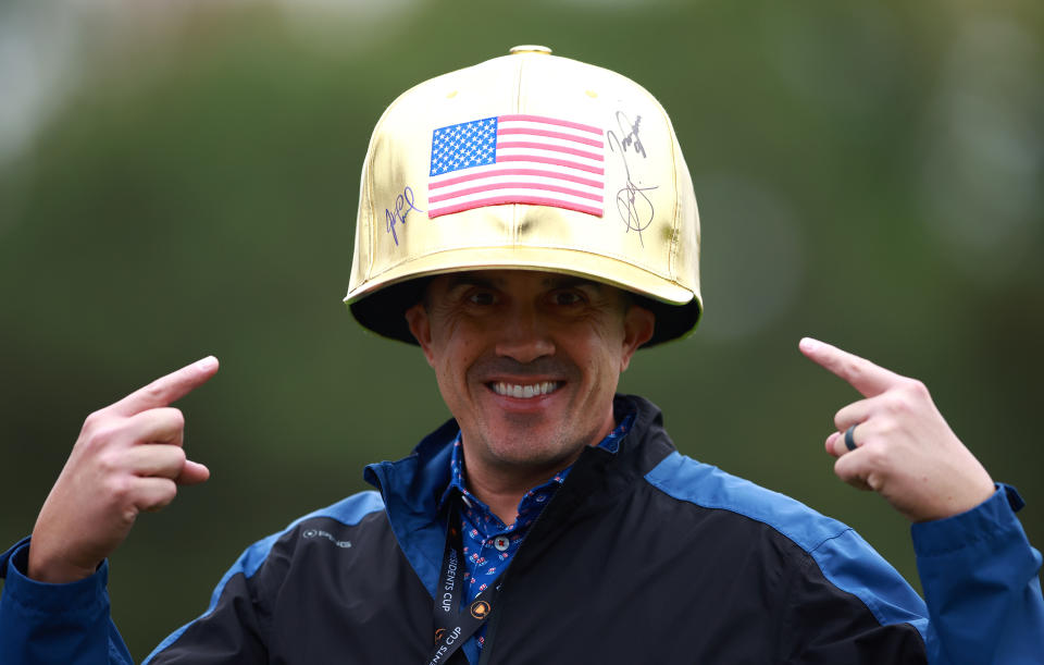 A fan wears an oversized hat during Wednesday's practice round. (Vaughn Ridley/Getty Images)