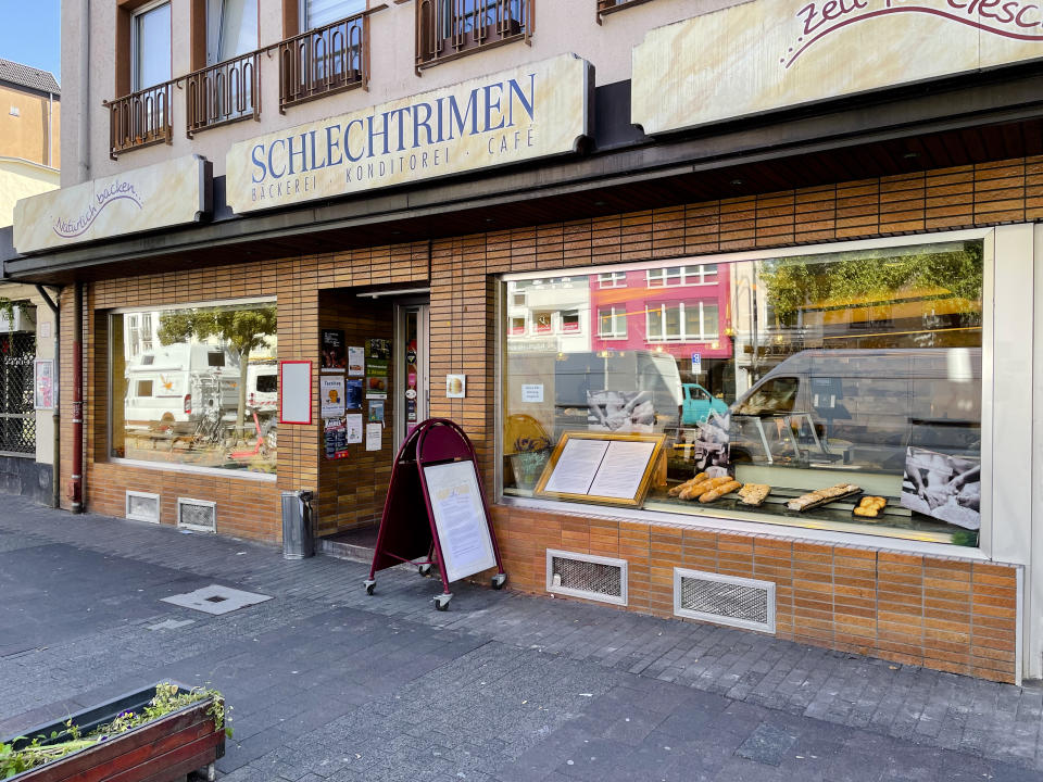 Bread items are displayed in the windows of the family bakery of Engelbert Schlechtrimen in Cologne, Germany, Wednesday, Sept. 21, 2022. For 90 years, the family of Engelbert Schlechtrimen has been baking wheat rolls, rye bread, apple, cheese and chocolate cakes in Cologne, but next month they'll turn off the ovens for good because they can no longer afford the rising energy prices resulting from Russia's war in Ukraine. (AP Photo/Daniel Niemann)