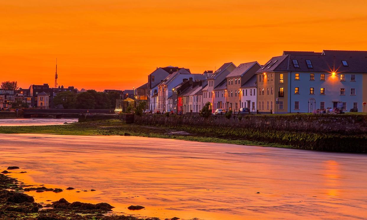 <span>Sunset over The Long Walk, Galway.</span><span>Photograph: Andrea Pucci/Getty Images</span>