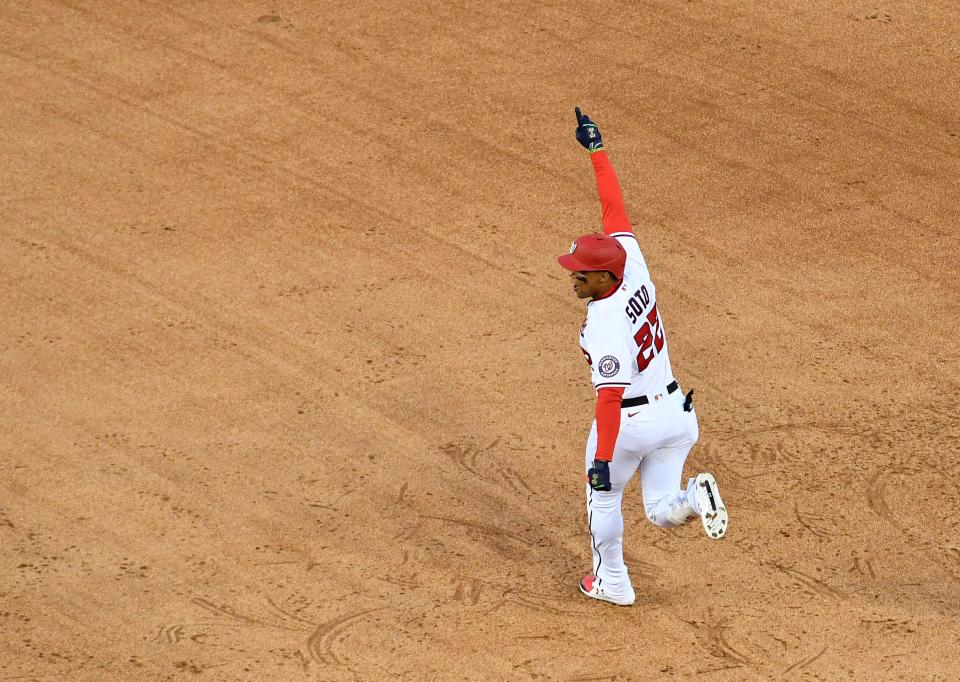 Juan Soto reacts after hitting a walk-off single against the Braves on Tuesday.