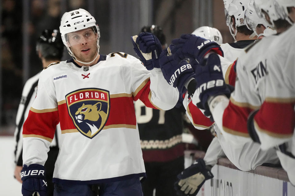 Florida Panthers center Carter Verhaeghe celebrates his goal against the Arizona Coyotes during the first period of an NHL hockey game Tuesday, Jan. 2, 2024, in Tempe, Ariz. (AP Photo/Ross D. Franklin)