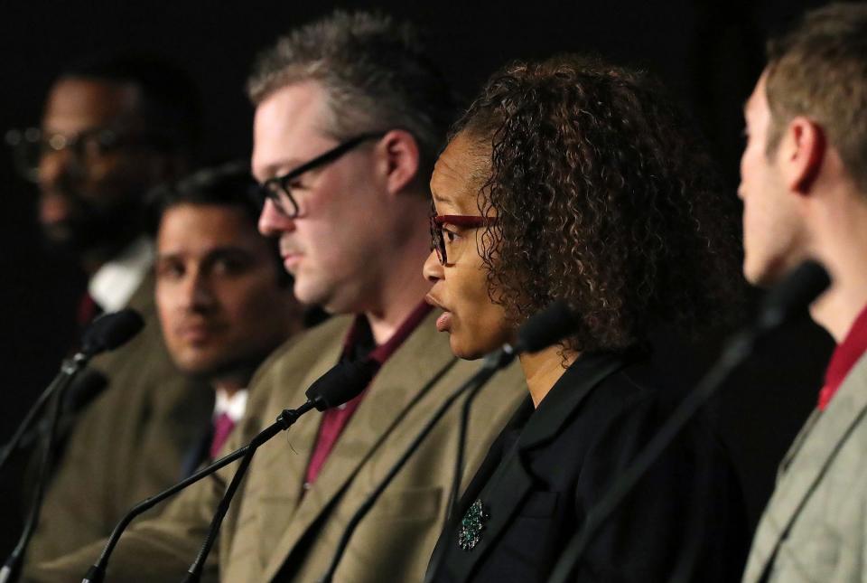 Mayoral candidate and Ward 5 Councilwoman Tara Mosley, center, answers a question during Akron Decides: Debating the Future.