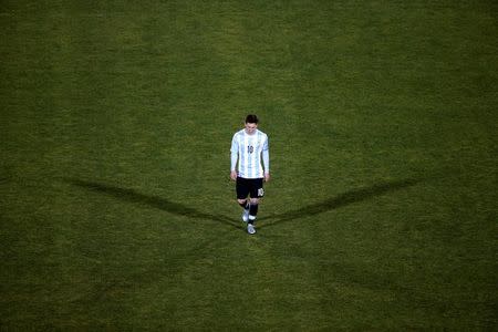 FILE PHOTO - Argentina's Lionel Messi reacts after his team's loss to Chile in their Copa America 2015 final soccer match at the National Stadium in Santiago, Chile, July 4, 2015. REUTERS/Ricardo Moraes/Files
