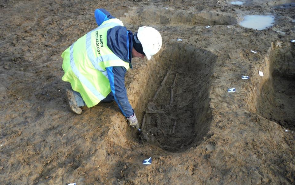 Archaeologists at work in Fenstanton excavate the Roman remains - Albion Archaeology/SWNS