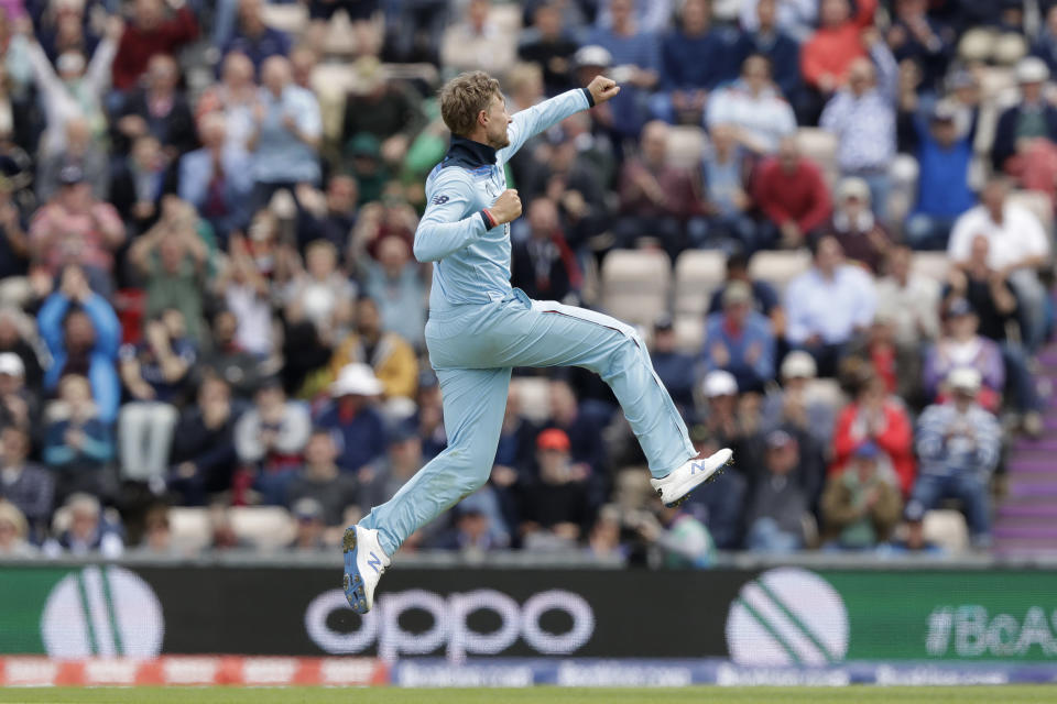 England's Joe Root celebrates taking the wicket of West Indies' captain Jason Holder during the Cricket World Cup match between England and West Indies at the Hampshire Bowl in Southampton, England, Friday, June 14, 2019. (AP Photo/Matt Dunham)
