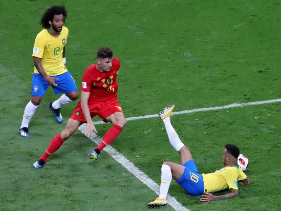 Neymar lying on the pitch.