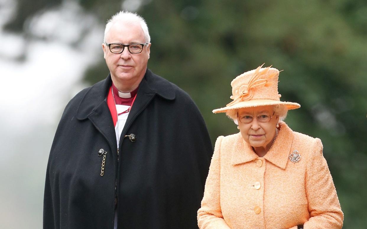 Queen Elizabeth II, alongside the Bishop of Lincoln Christopher Lowson attending the church of St Peter - Chris Radburn/PA Archive