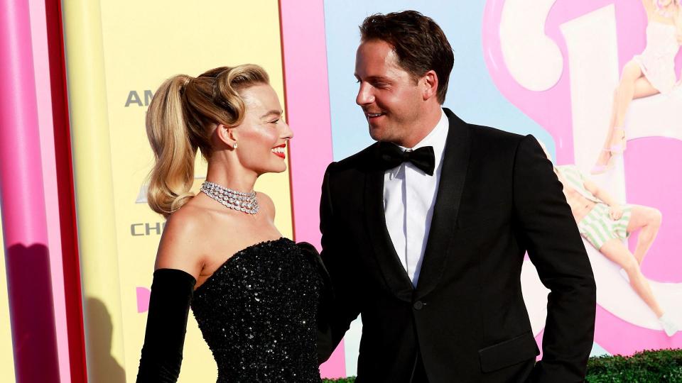 Australian actress Margot Robbie and her husband British producer Tom Ackerley arrive for the world premiere of 