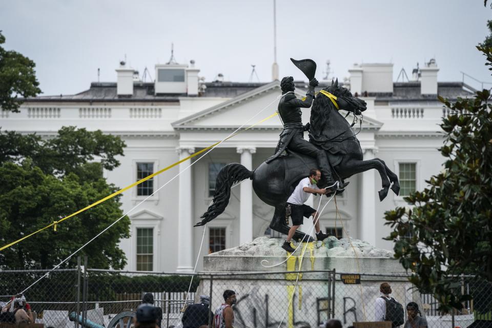 Protesters attempt to pull down the statue of Andrew Jackson in Lafayette Square near the White House on June 22, 2020, in Washington, D.C. Protests continue around the country over police brutality, racial injustice and the deaths of African Americans while in police custody.