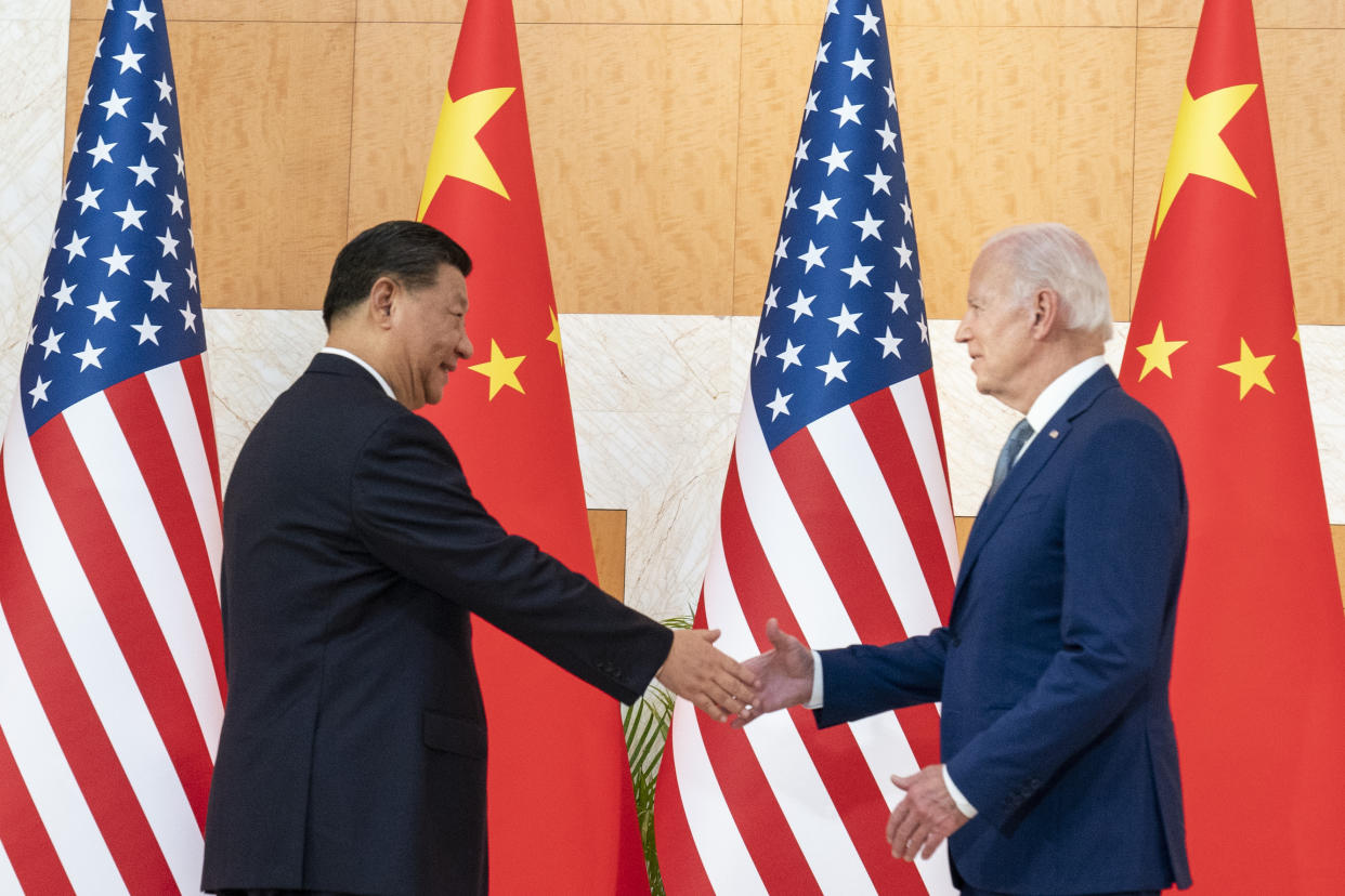 U.S. President Joe Biden and Chinese President Xi Jinping shake hands before a meeting on the sidelines of the G20 summit meeting, Nov. 14, 2022, in Bali, Indonesia. (AP Photo/Alex Brandon)