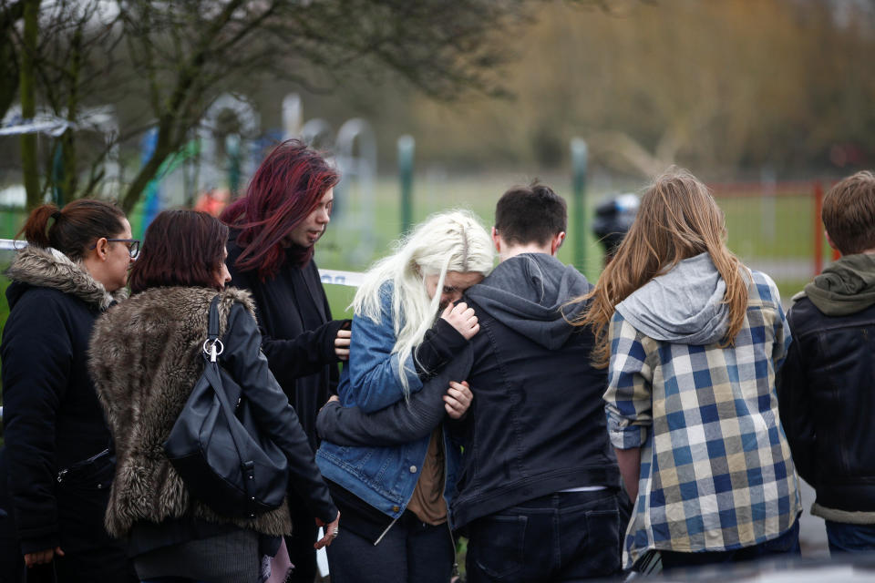 People visit a site near to where 17-year-old Jodie Chesney was killed, at the Saint Neots Play Park in Harold Hill, east London (Picture: Reuters)