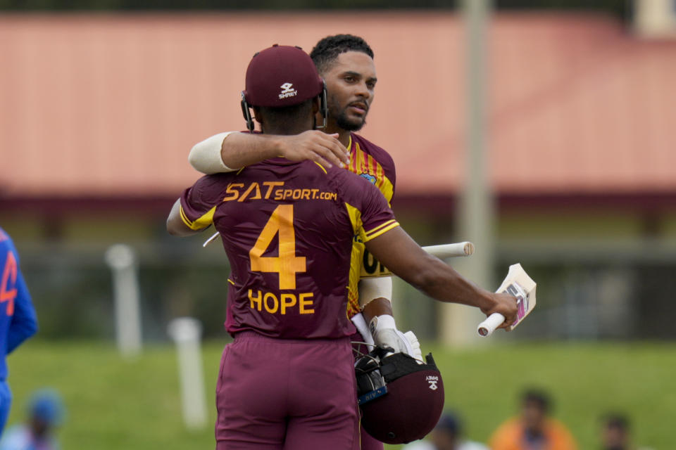 West Indies' Brandon King and Shai Hope embrace after beating India by 8 wickets in the fifth T20 cricket match at Central Broward Regional Park in Lauderhill, Fla, Sunday, Aug. 13, 2023. (AP Photo/Ramon Espinosa)