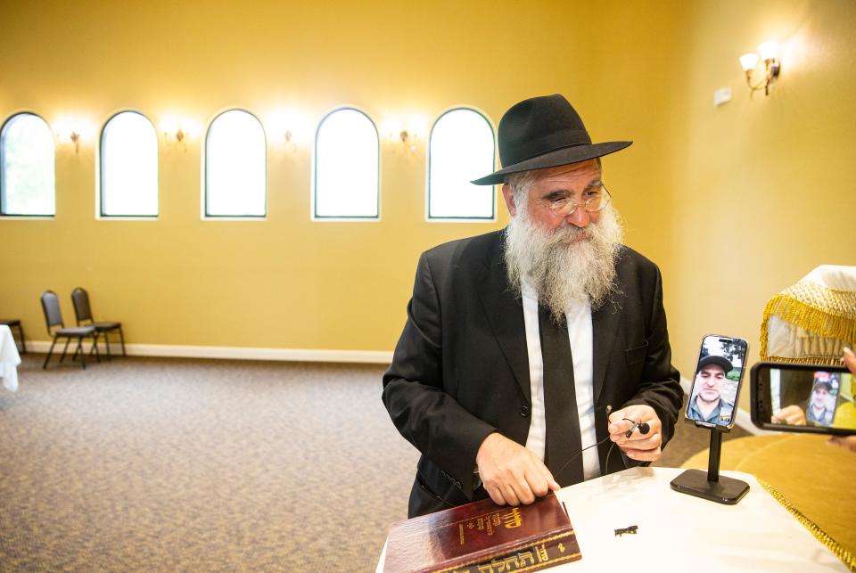 Rabbi Yitzchok Minkowicz of Chabad Lubavitch of Southwest Florida speaks to the media about the war in Israel on Tuesday, Oct. 10, 2023. The media interviewed Logan, a Fort Myers resident and member of the Chabad Lubavitch of Southwest Florida who was called up by the Israeli military reserves. Logan declined to give his last name due to safety reasons.