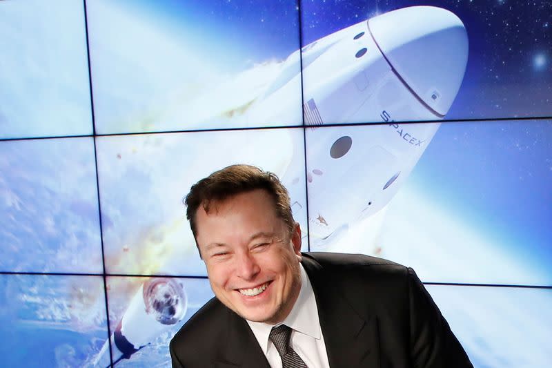 FILE PHOTO: SpaceX founder and chief engineer Elon Musk reacts at a post-launch news conference to discuss the SpaceX Crew Dragon astronaut capsule in-flight abort test at the Kennedy Space Center