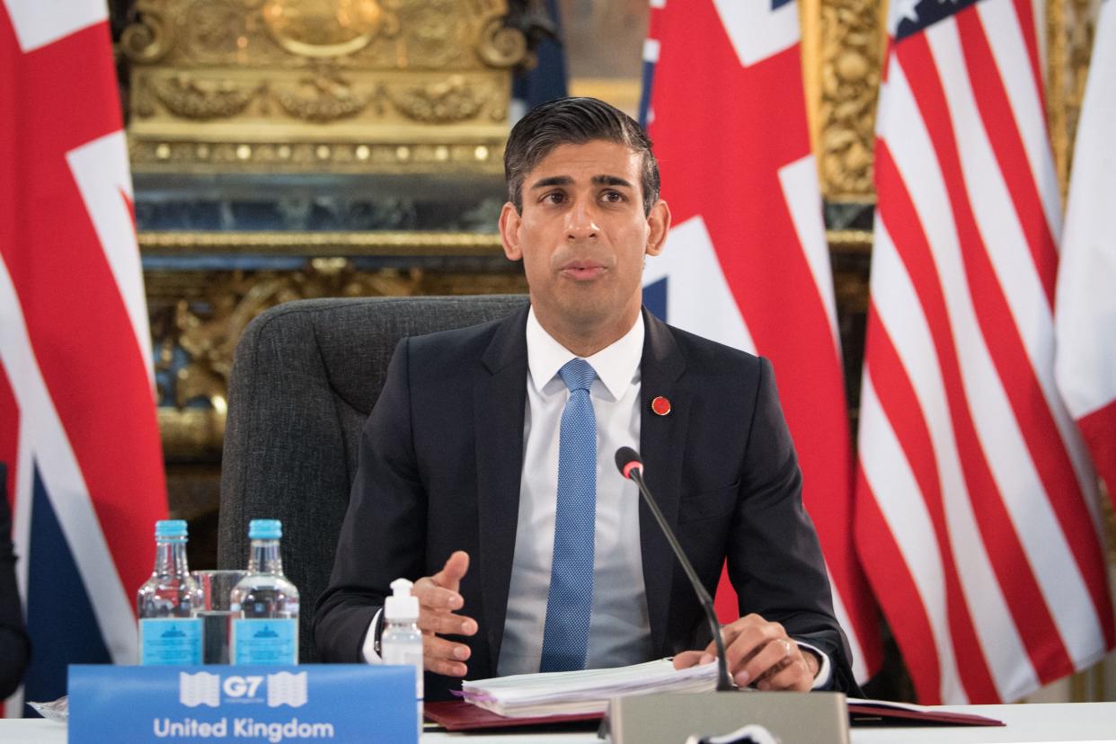 Britain's Chancellor of the Exchequer Rishi Sunak gestures on the first day of the G7 Finance Ministers Meeting at Lancaster House in London on June 4, 2021. - Group of Seven (G7) finance chiefs gather this week to hammer out an agreement on corporate tax harmonisation aimed at raising revenues as economies recover from the coronavirus pandemic. (Photo by Stefan Rousseau / POOL / AFP) (Photo by STEFAN ROUSSEAU/POOL/AFP via Getty Images)