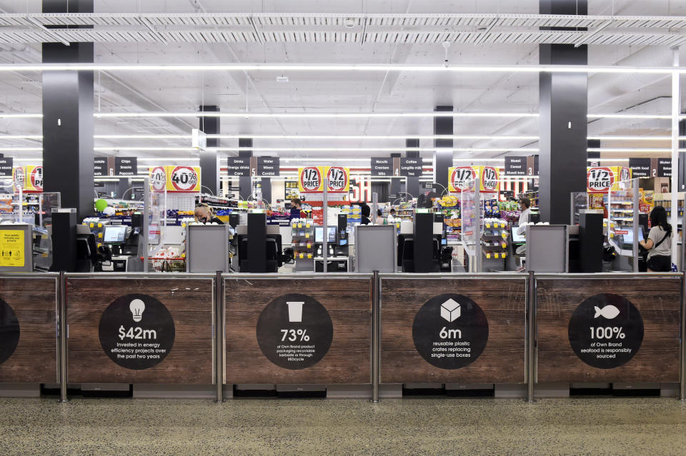 Coles sustainability signs at checkout in store. Source: Bloomberg via Getty Images