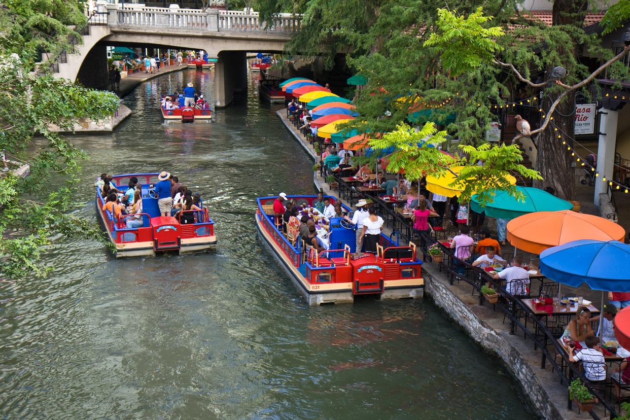 Riverwalk in downtown San Antonio, Texas with water taxis